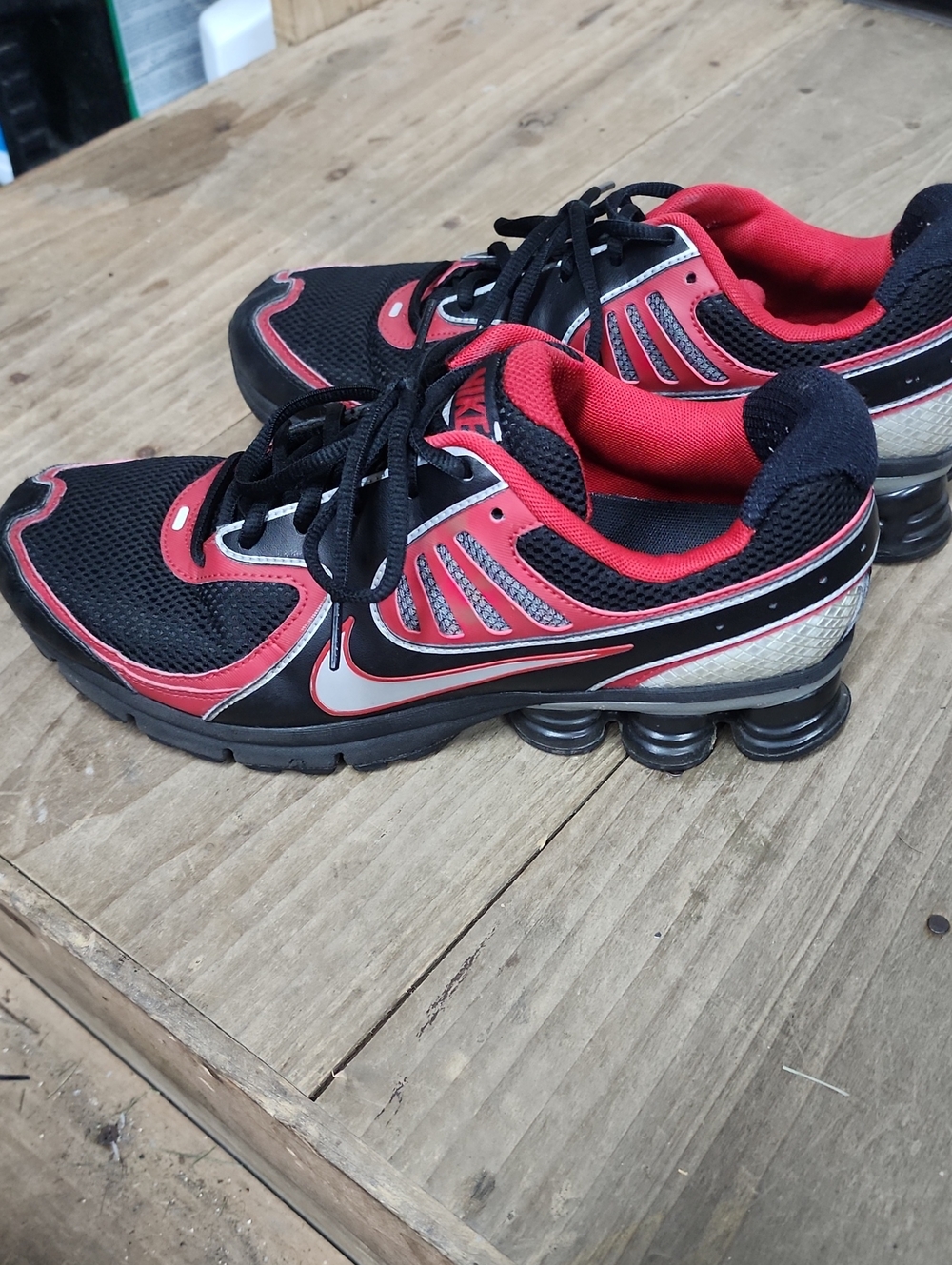 Nike Black and Red Athletic Sneakers with Spring Sole